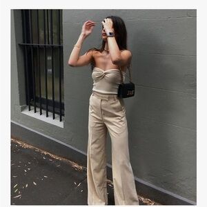 Soft and stylish cream knotted tube top, size small. Excellent condition